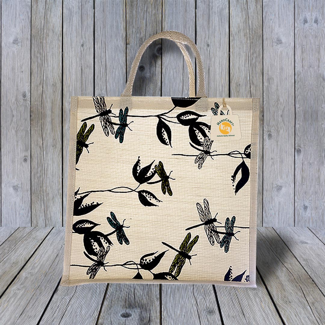 Natural-colour tote with an all-over dragonfly and leaf print.