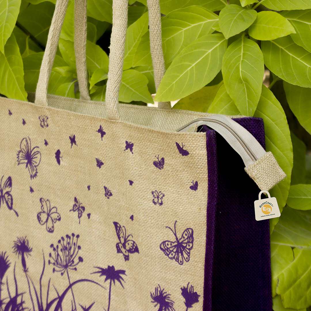 Bag with a purple butterfly and floral pattern.