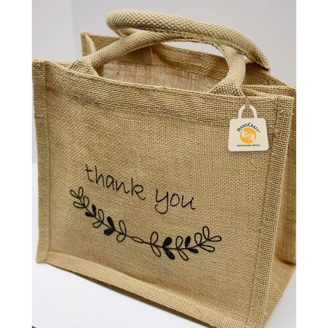 Natural-colour bag with a thank-you print and rounded padded handles.