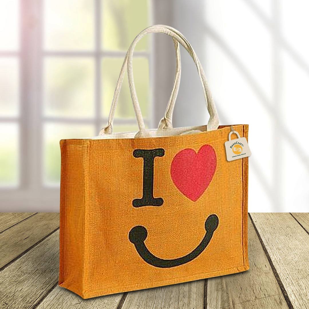 Orange bag with a large printed heart and smile design.
