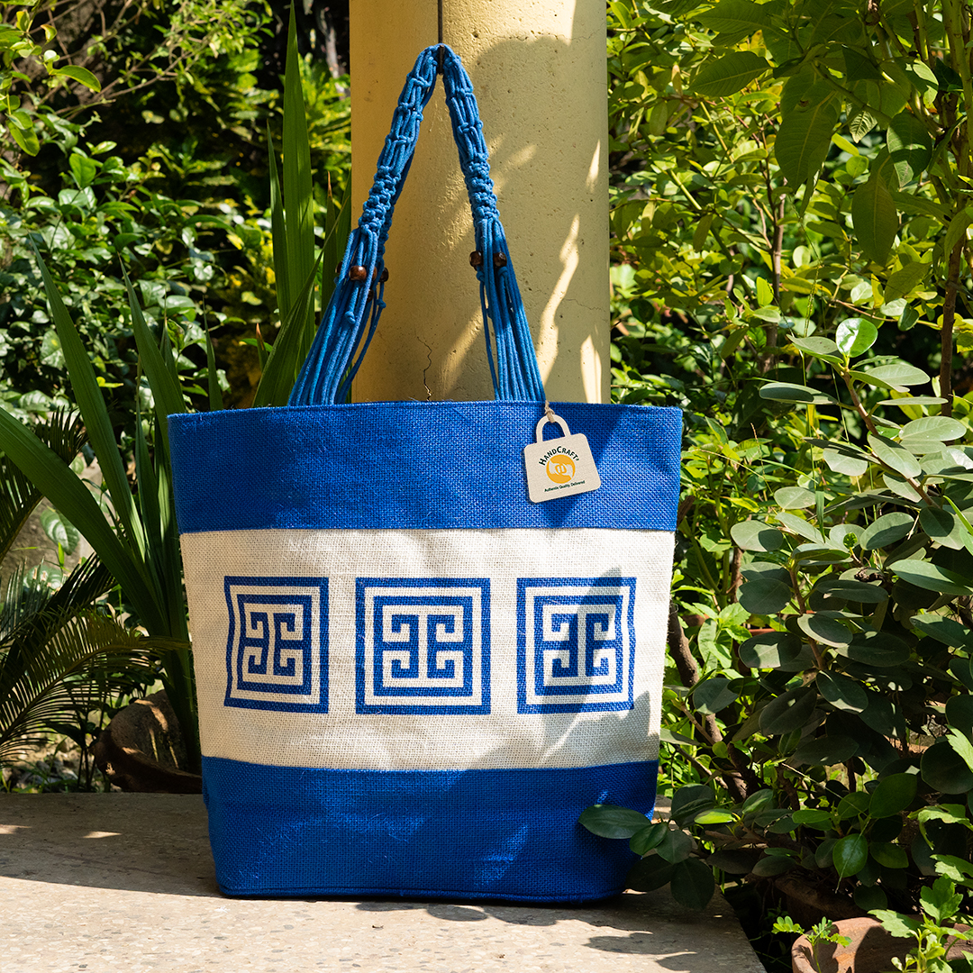 Blue and white patterned tote with blue handles.