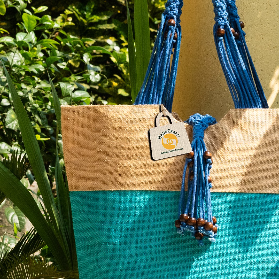 Stitched seams and handle joins on a finished jute bag