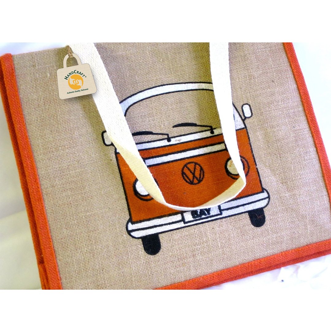 Bag printed with a camper-van illustration.