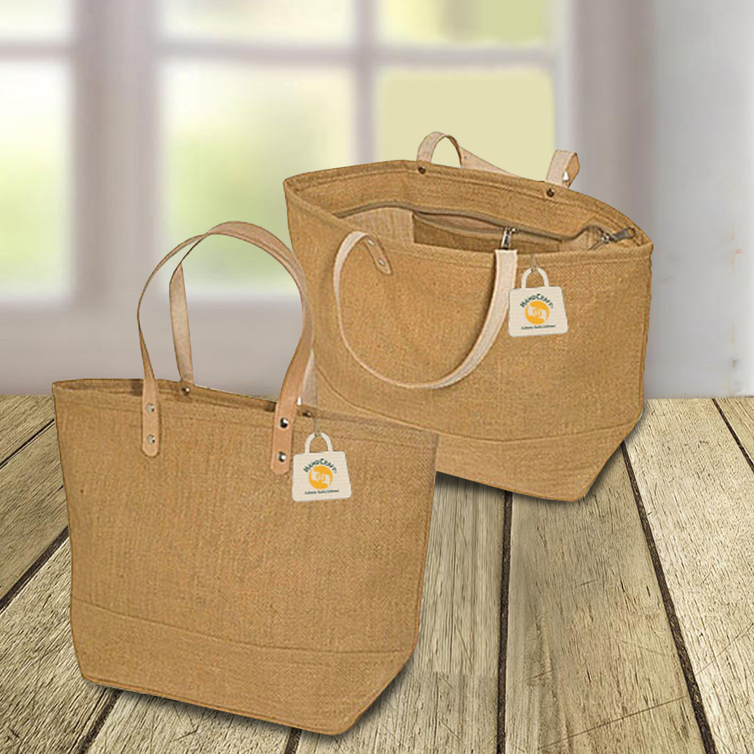 Two natural-colour bags with flat handles.